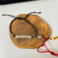 Confezione da 2 braccialetti rossi e neri con magnete